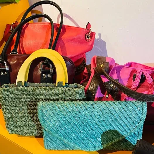 A collection of colorful handbags on display in Pomona