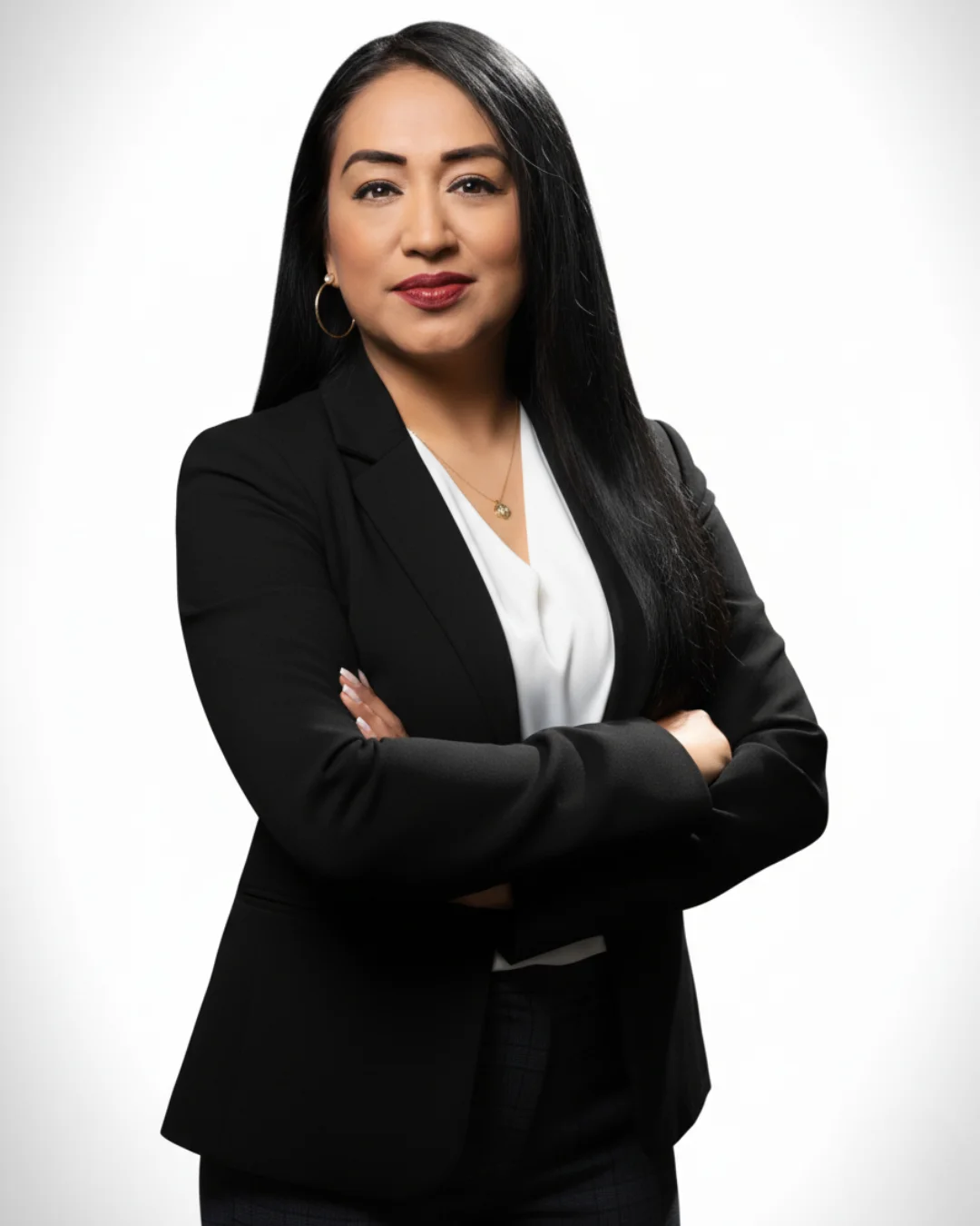 half body shot of Brenda Tencle in balck suit blazer.